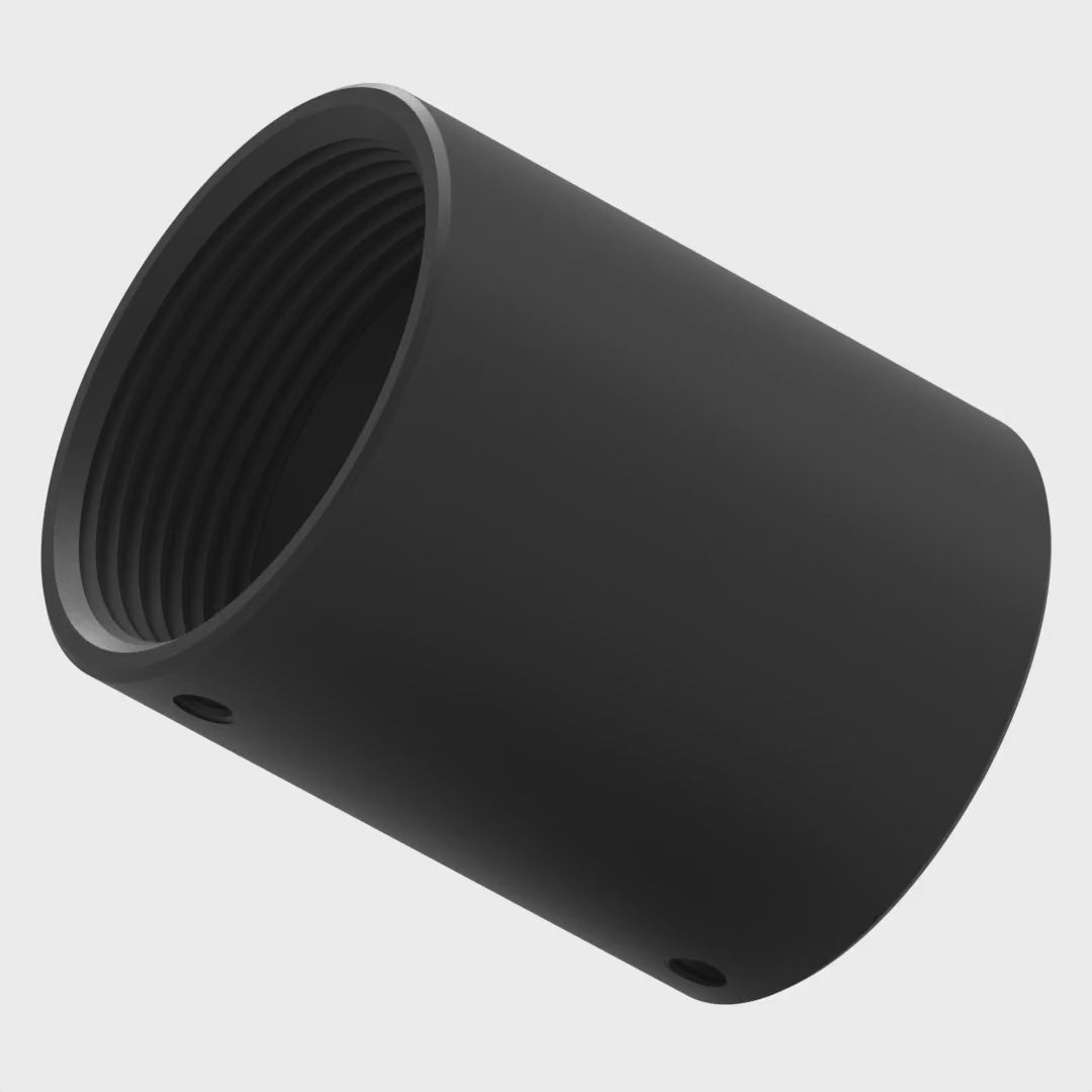11AC001 aluminum pipe coupler tumbling end over end, showing the internal 1-1/2 inch NPT threads at both ends and the set screw holes