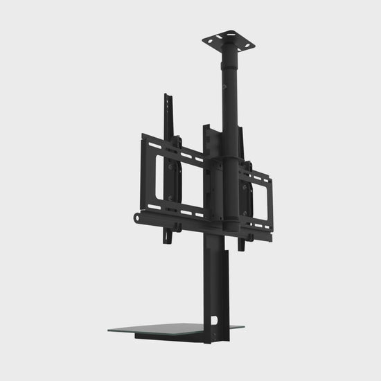 TV ceiling mount with black glass shelf swivelling a full 360 degrees around its mast, the tilting twin-rail head and the shelf turning together while the flat ceiling plate, the mast and its collar stay still.