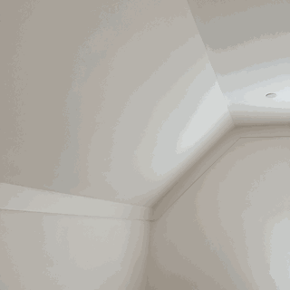 Angled wall TV mount on a slanted ceiling